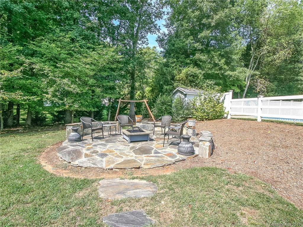2819 Farmstead Lane Fort Mill, SC 29708 - Photo 5 of 24 a view of a table and chairs in the patio