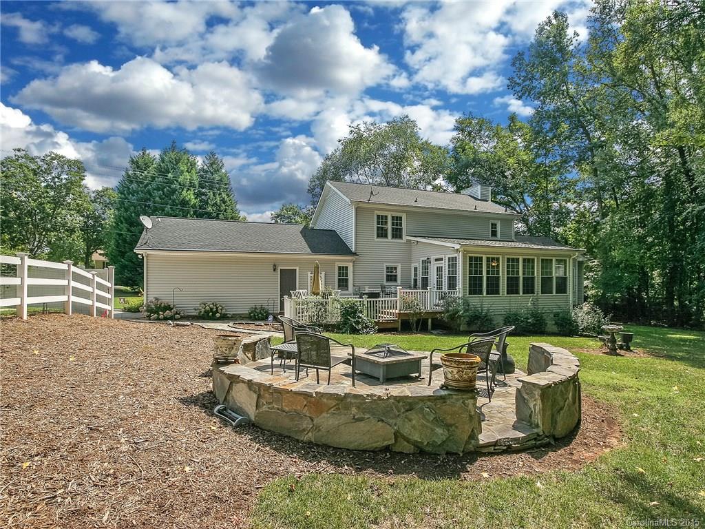 2819 Farmstead Lane Fort Mill, SC 29708 - Photo 7 of 24 a view of a house with pool and a garden
