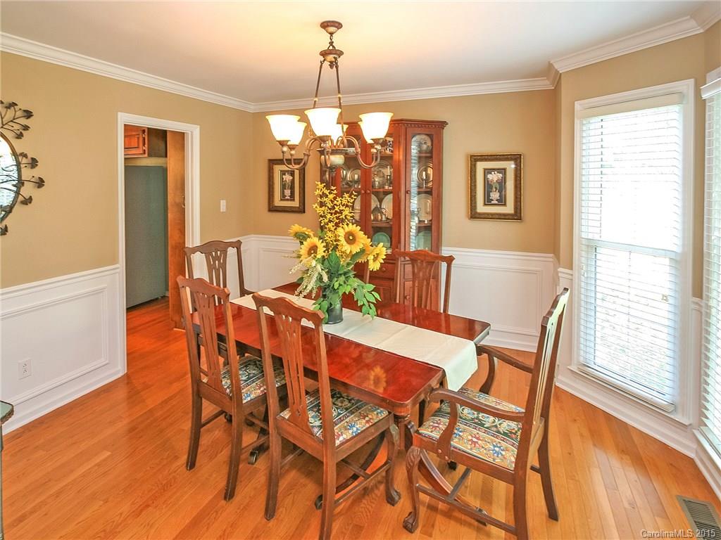 2819 Farmstead Lane Fort Mill, SC 29708 - Photo 9 of 24 a view of a dining room with furniture window and wooden floor