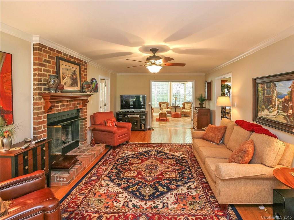 2819 Farmstead Lane Fort Mill, SC 29708 - Photo 10 of 24 a living room with furniture fireplace and flat screen tv