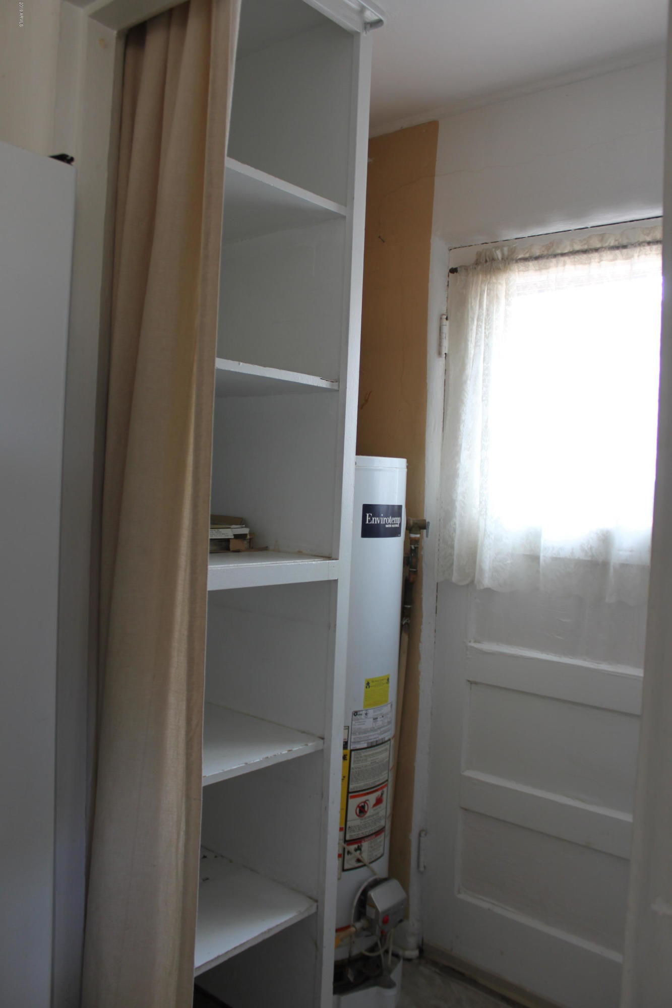 1905 West Monte Vista Road Phoenix, AZ 85009 - Photo 7 of 19 Pantry/side door