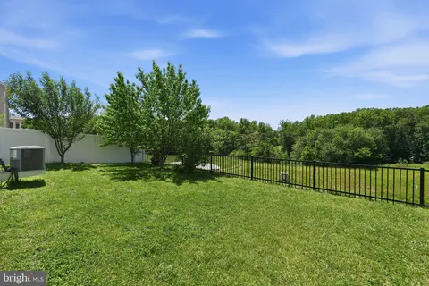 a view of a backyard with a garden