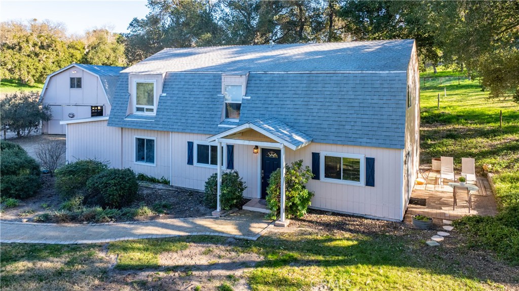 6704 Old Goat Road Creston, CA 93432 - Photo 1 of 1 a front view of a house with garden