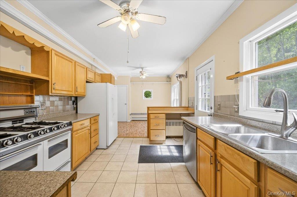 14 Moss Hill Road Holmes, NY 12531 - Photo 13 of 50 a kitchen with stainless steel appliances granite countertop a sink and a stove