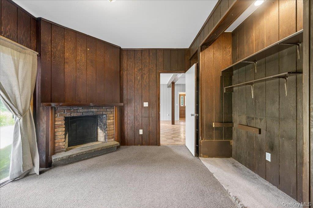 14 Moss Hill Road Holmes, NY 12531 - Photo 21 of 50 a view of empty room with fireplace and shower