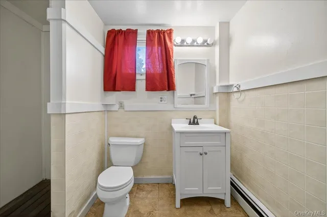 a view of balcony with furniture and wooden floor