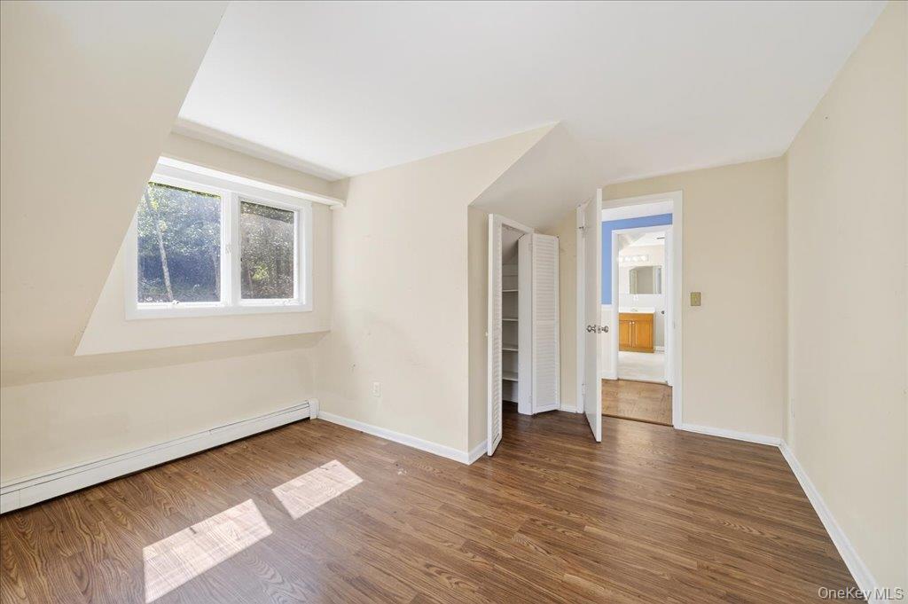 14 Moss Hill Road Holmes, NY 12531 - Photo 30 of 50 an empty room with wooden floor and windows