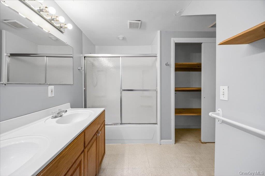 14 Moss Hill Road Holmes, NY 12531 - Photo 35 of 50 a bathroom with a sink and a mirror