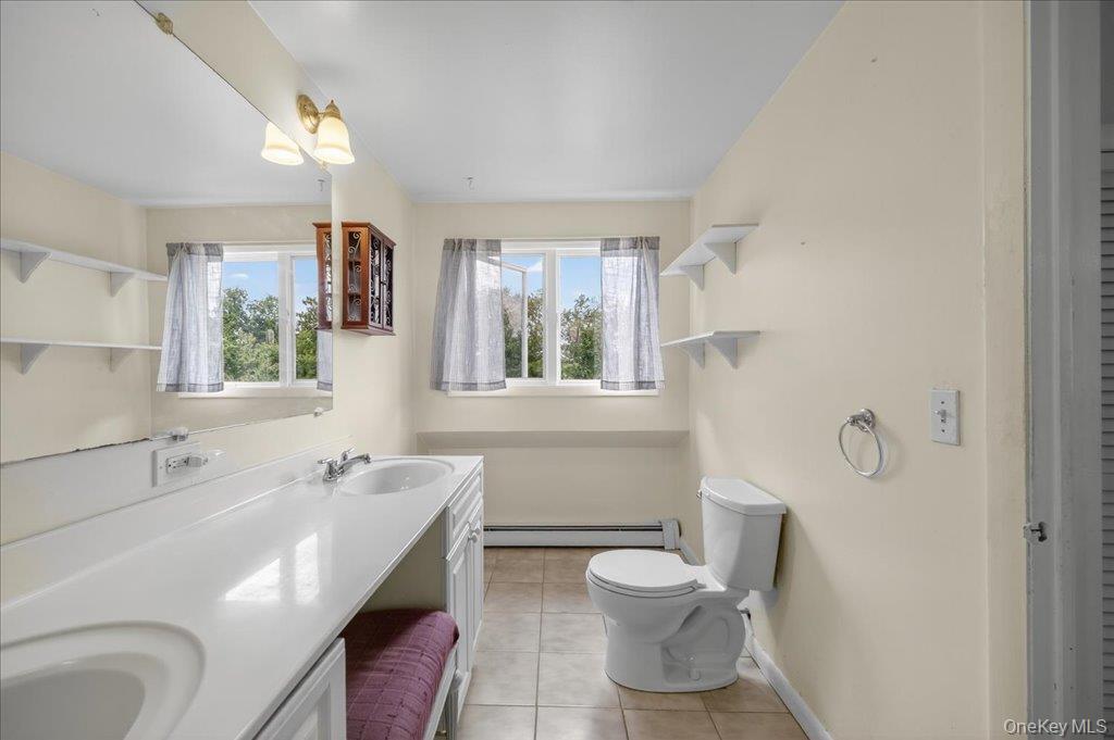 14 Moss Hill Road Holmes, NY 12531 - Photo 41 of 50 a bathroom with a sink toilet and shower