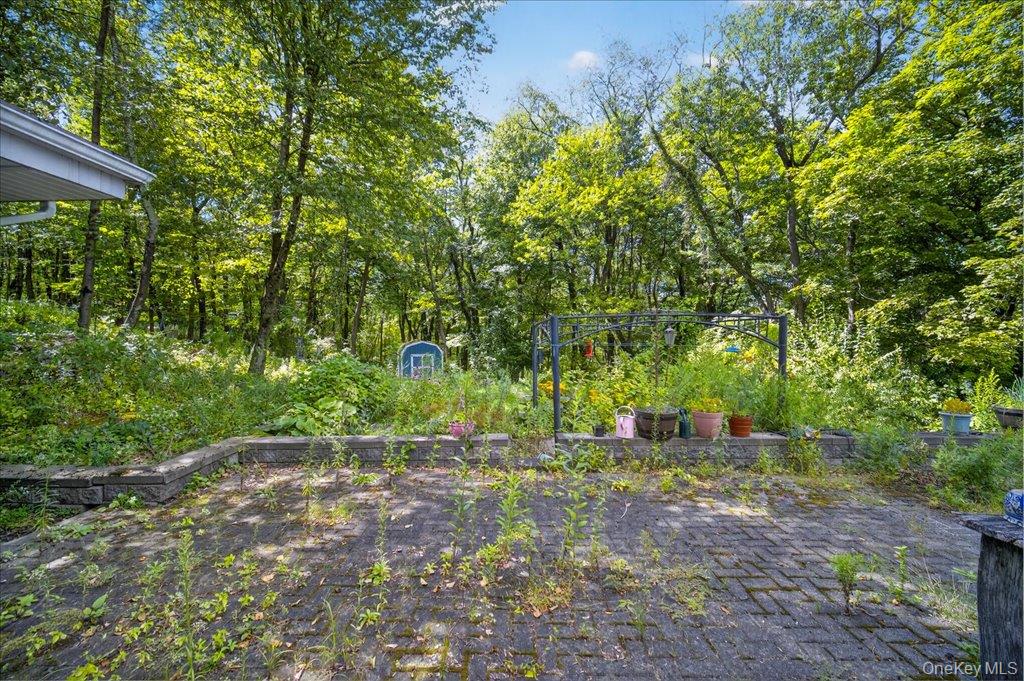 14 Moss Hill Road Holmes, NY 12531 - Photo 44 of 50 a backyard of a house with lots of green space
