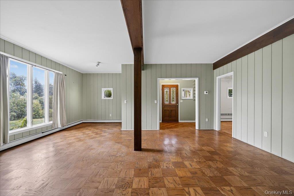 14 Moss Hill Road Holmes, NY 12531 - Photo 7 of 50 a view of a big room with windows and wardrobe