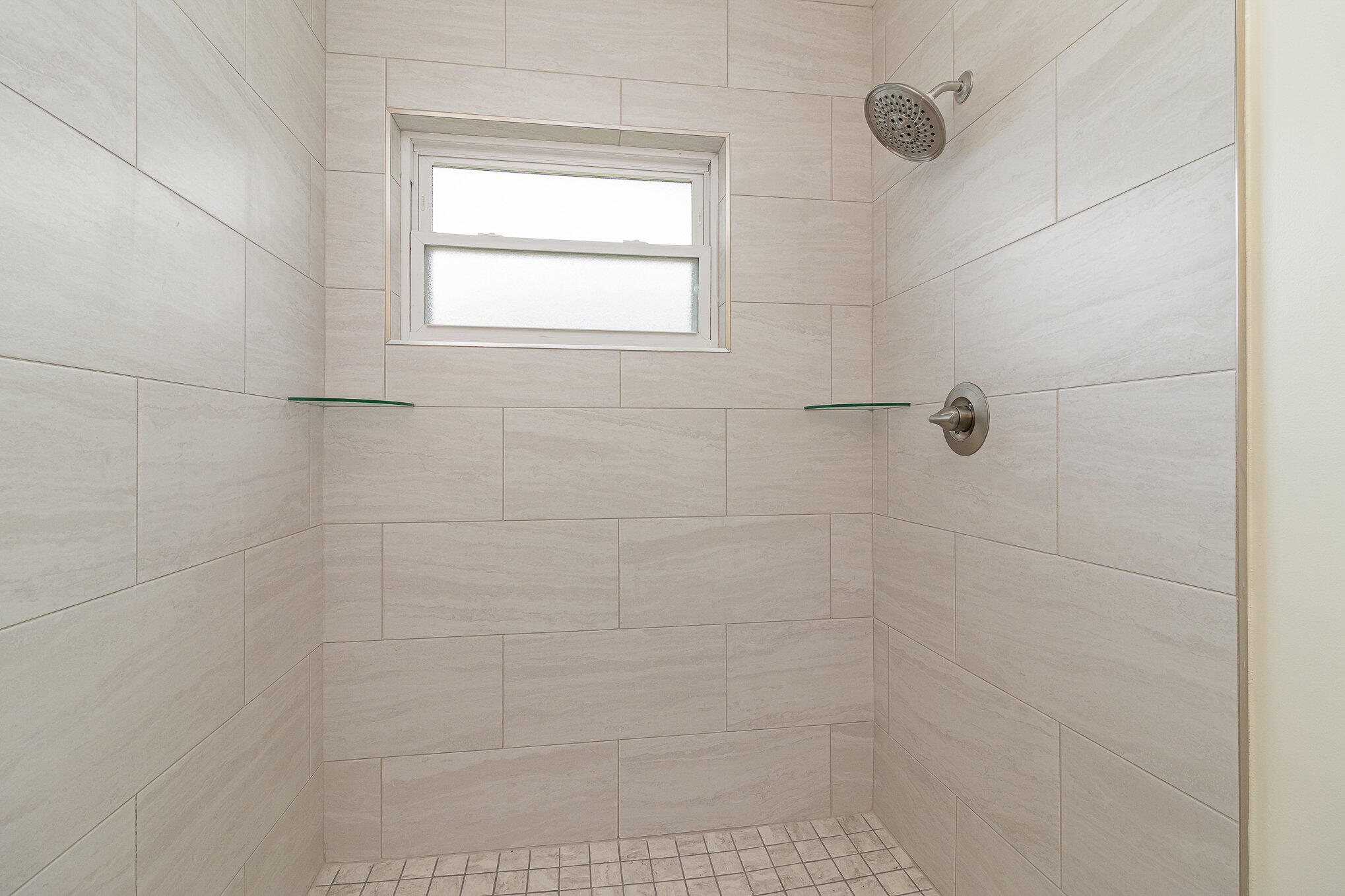 446 Timberlake Drive Melbourne, FL 32940 - Photo 13 of 20 a bathroom with a shower