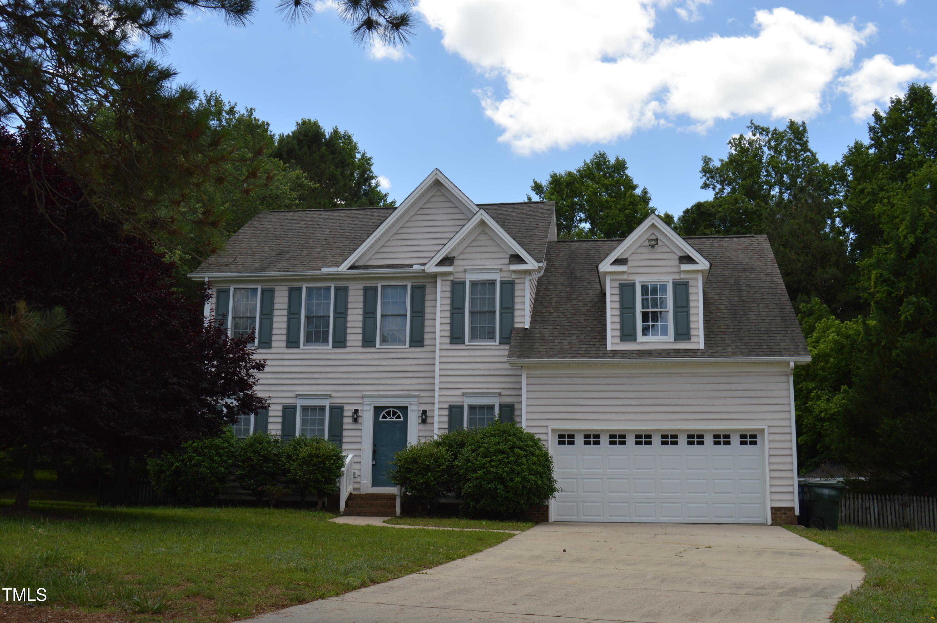 3401 Kensett Way Raleigh, NC 27616 - Photo 1 of 31 a front view of a house with a yard