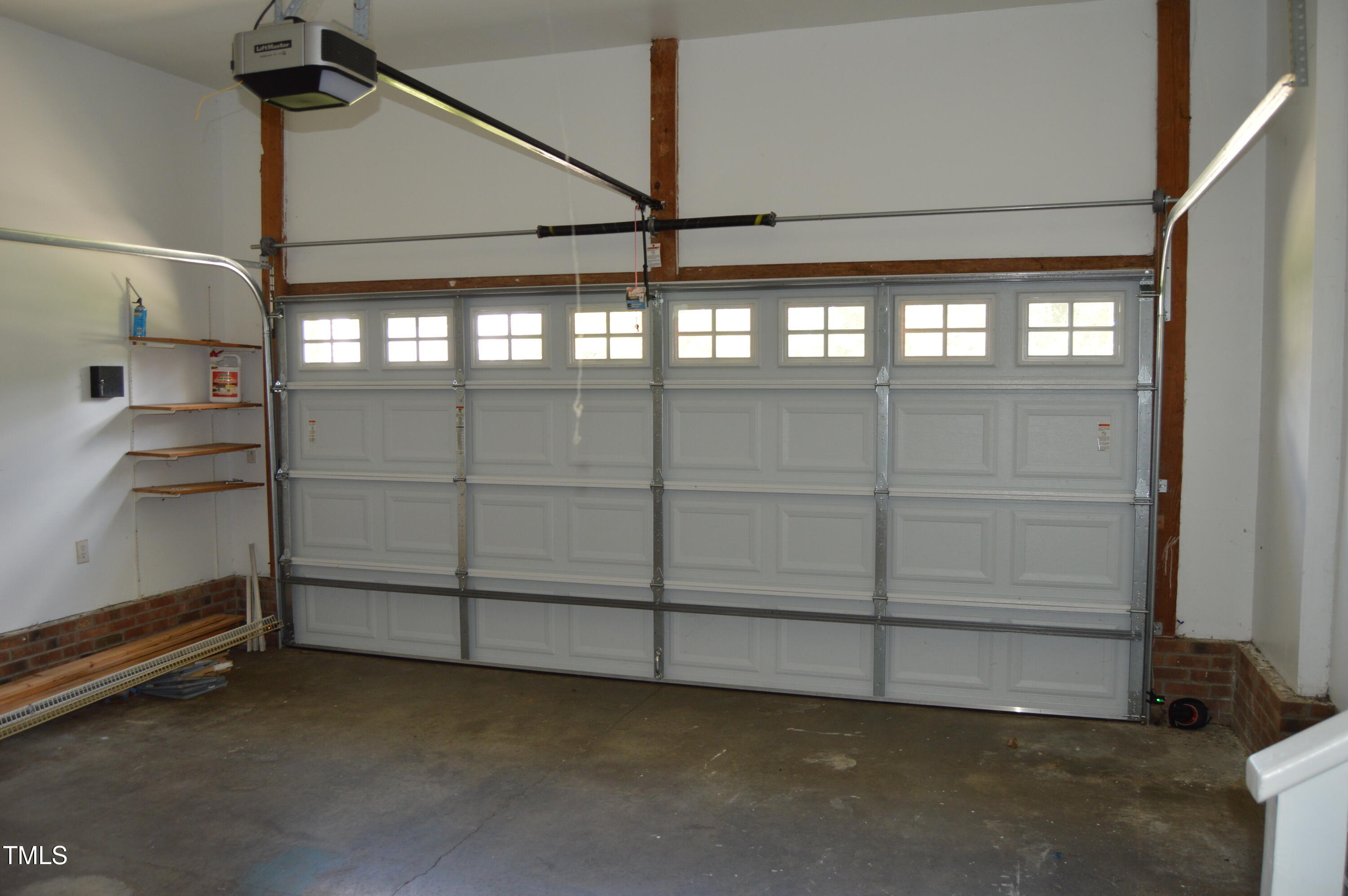 3401 Kensett Way Raleigh, NC 27616 - Photo 18 of 31 a view of a room with rack and racks on the wall