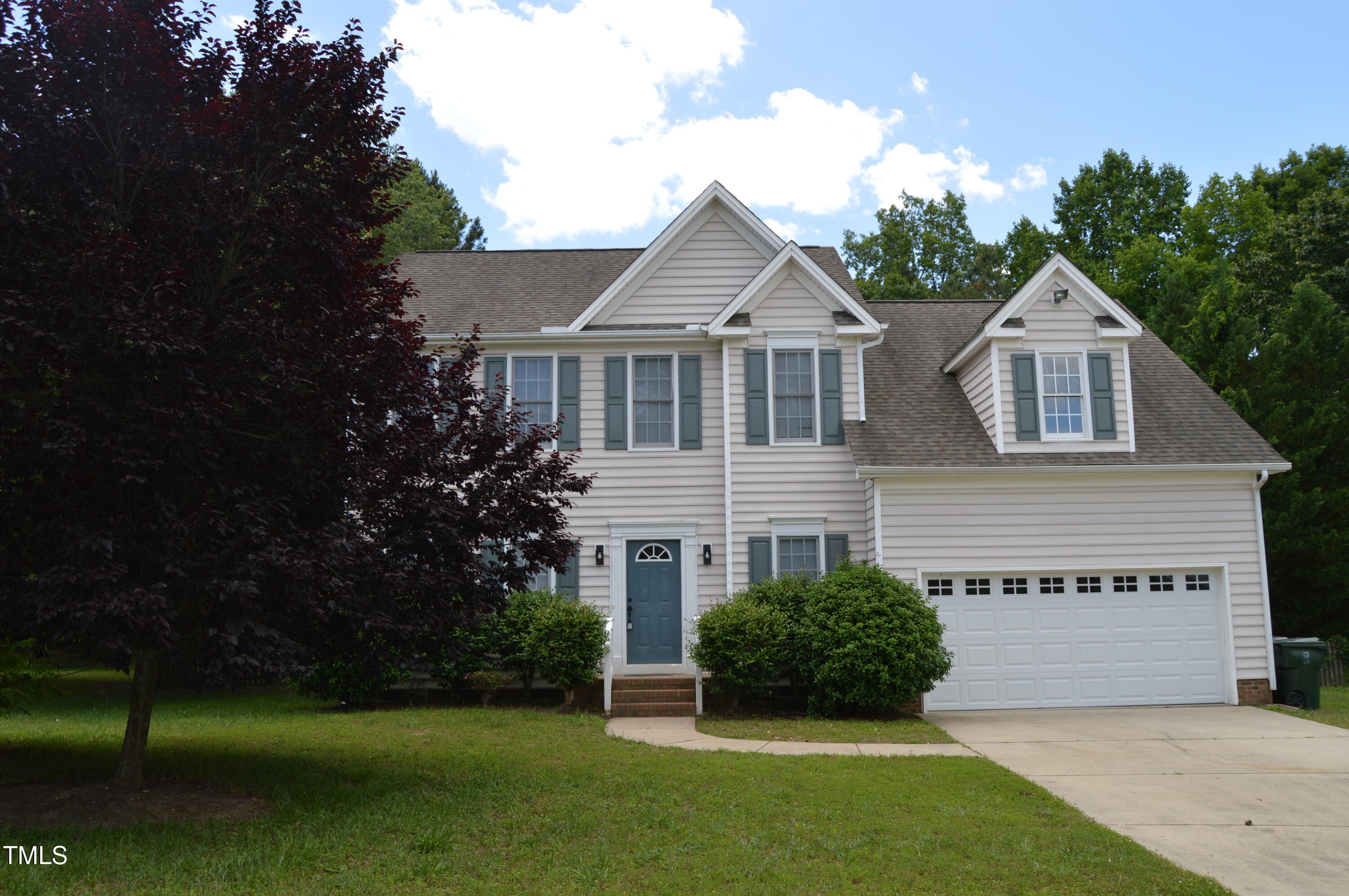 3401 Kensett Way Raleigh, NC 27616 - Photo 2 of 31 a view of a house with a yard and potted plants