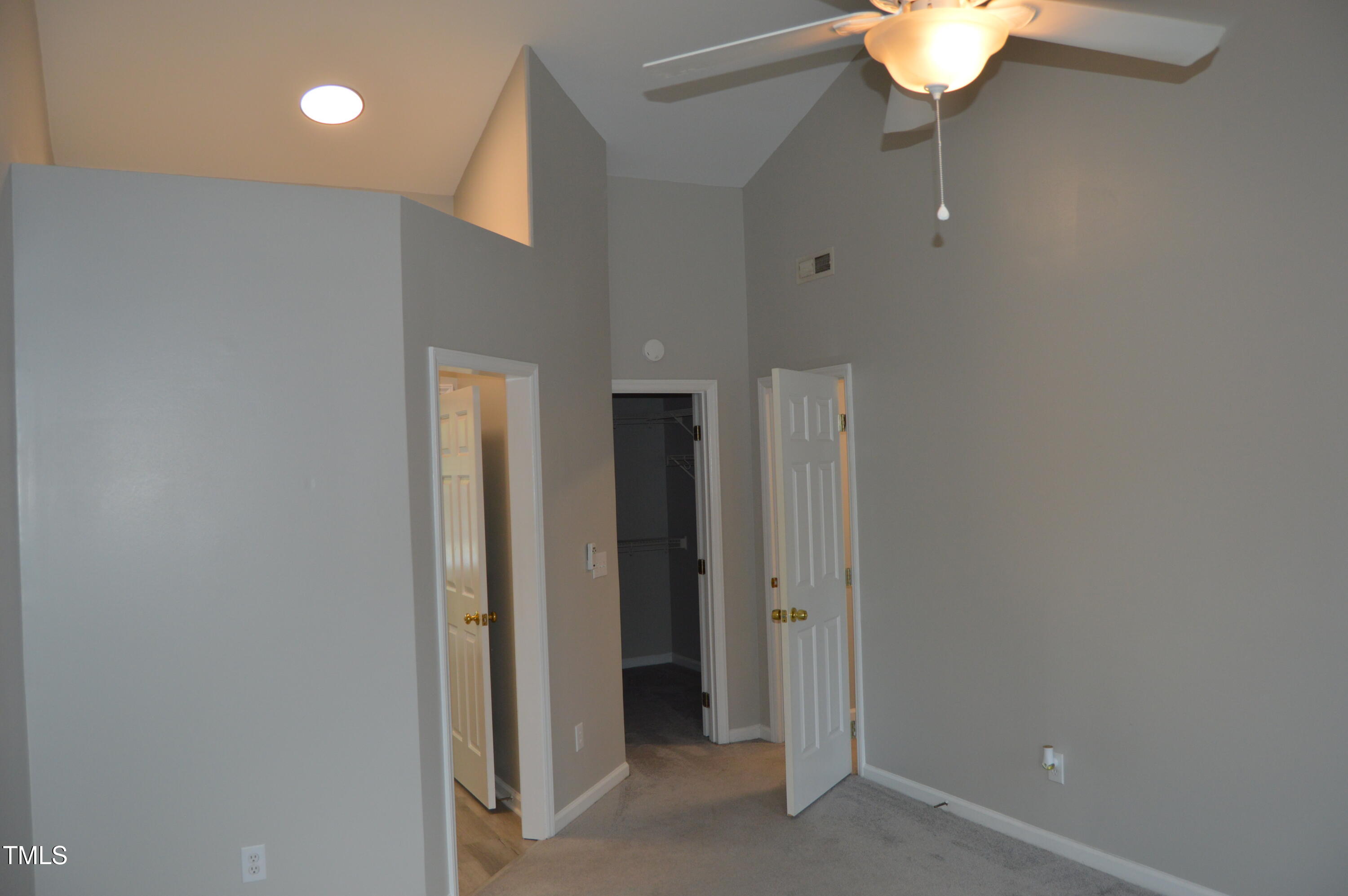 3401 Kensett Way Raleigh, NC 27616 - Photo 22 of 31 a view of hallway with a mirror