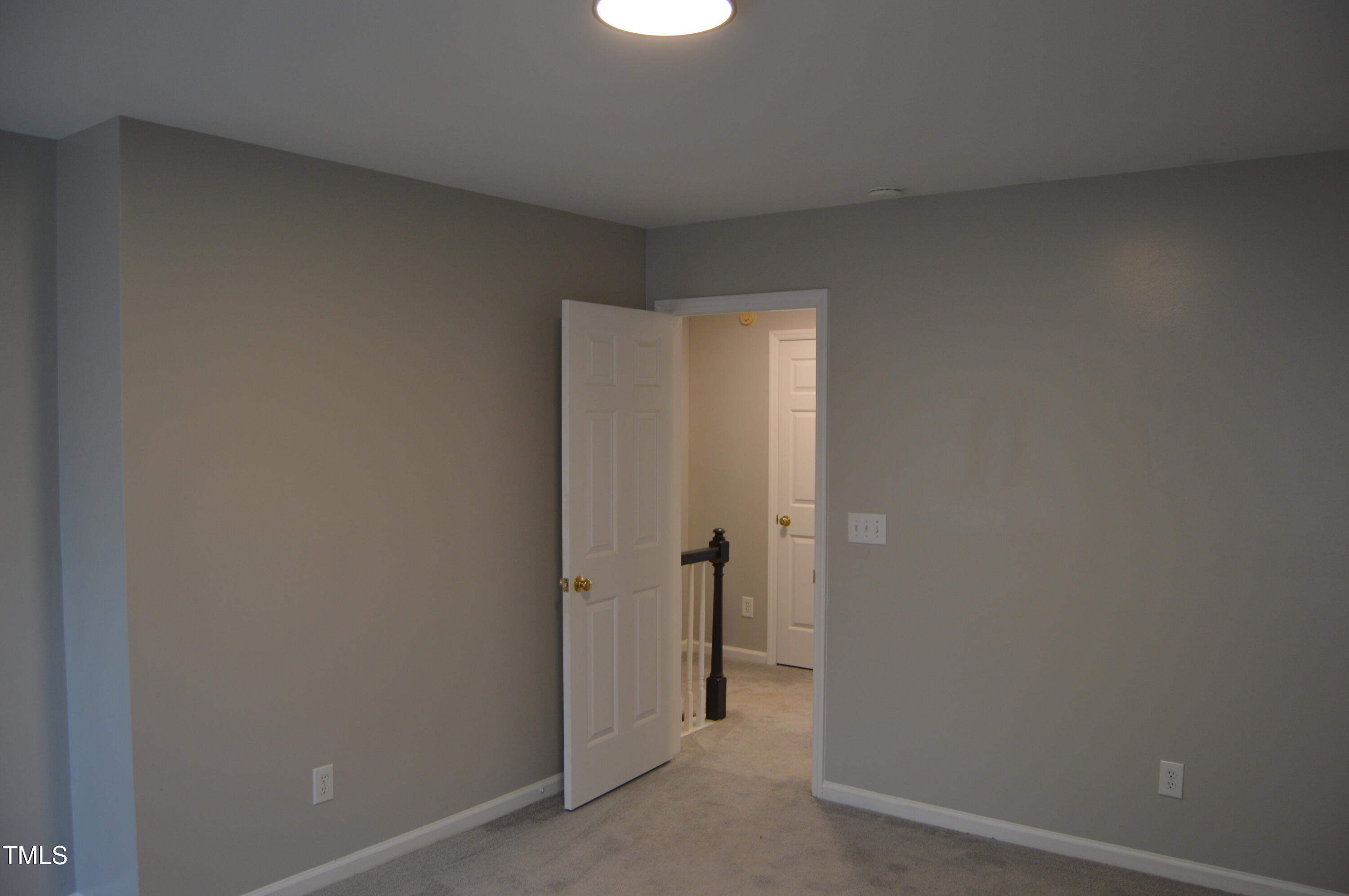 3401 Kensett Way Raleigh, NC 27616 - Photo 28 of 31 a view of room with a hallway