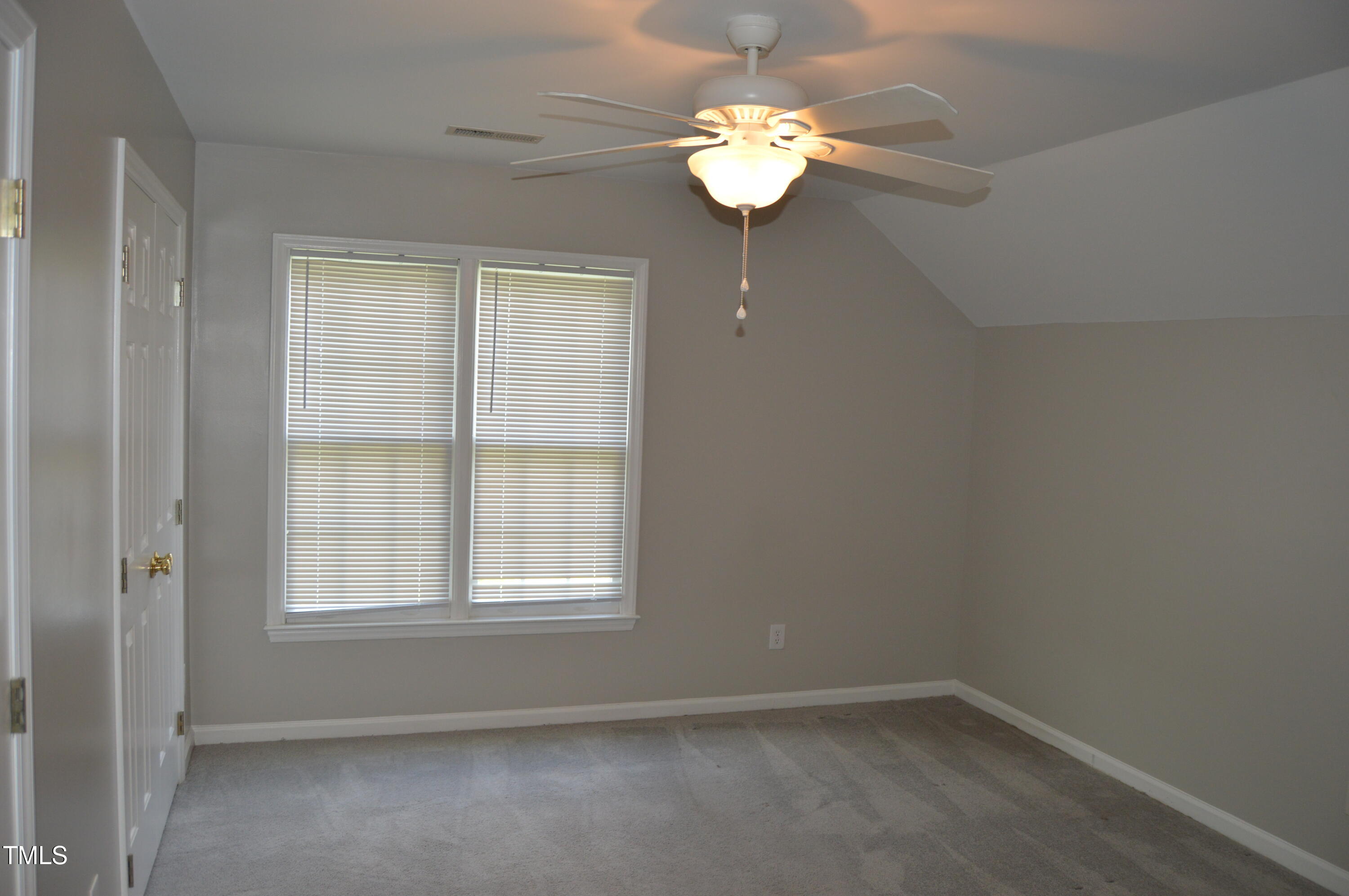 3401 Kensett Way Raleigh, NC 27616 - Photo 30 of 31 an empty room with a window