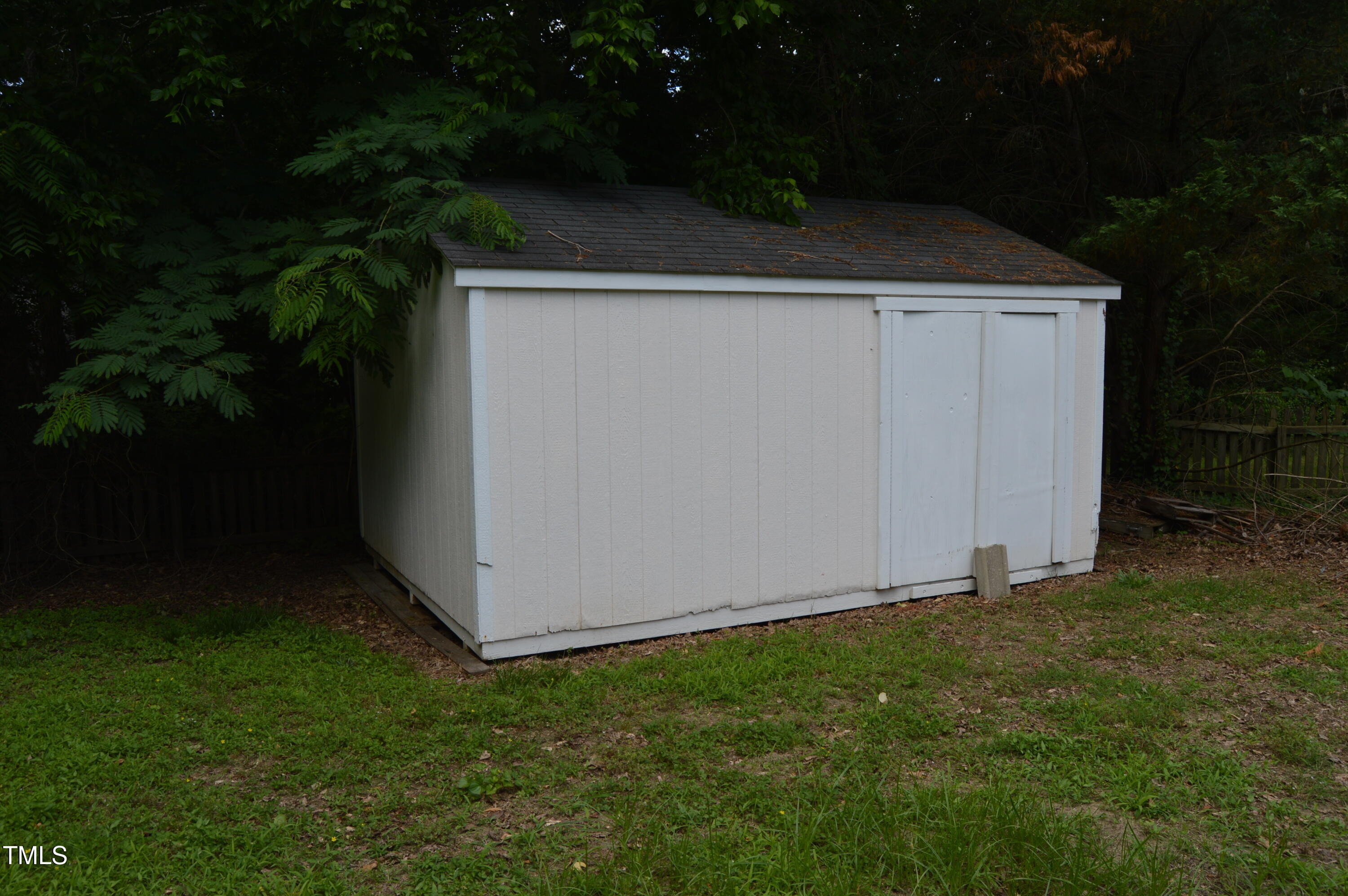 3401 Kensett Way Raleigh, NC 27616 - Photo 3 of 31 a view of backyard with cabin