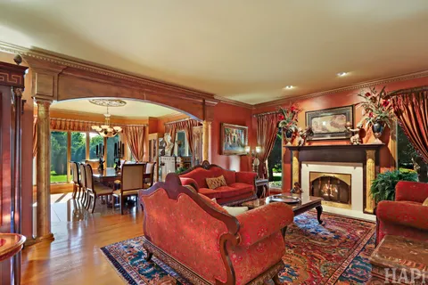 a living room with furniture and a rug