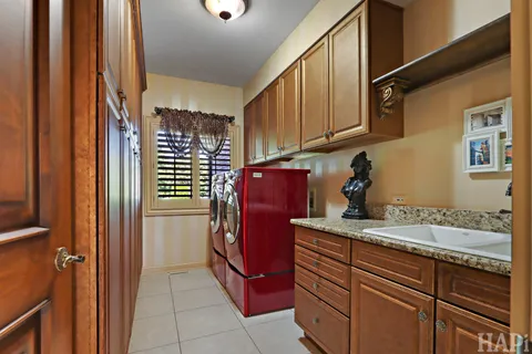 a bathroom with a glass shower door and a glass door