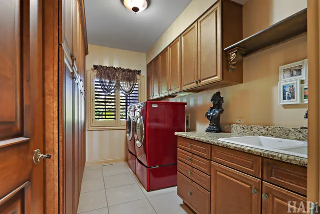 a bathroom with a glass shower door and a glass door