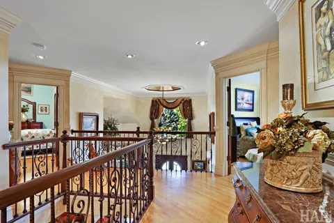 a bathroom with a granite countertop sink a mirror and a vanity