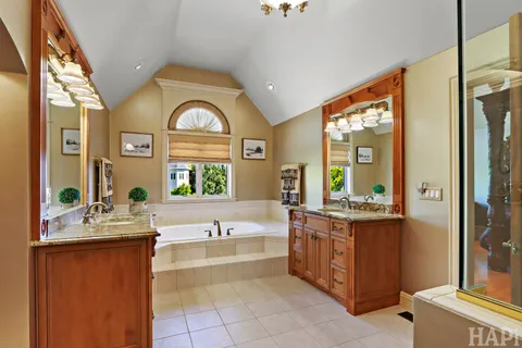 a bedroom with furniture and a fireplace