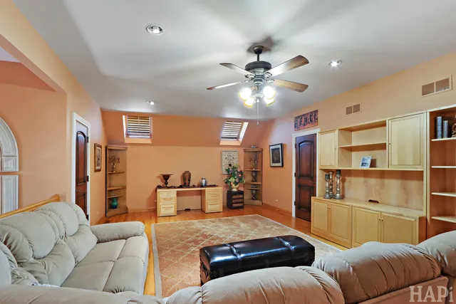 a view of a house with backyard porch and sitting area