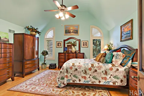 a view of a backyard with sitting area