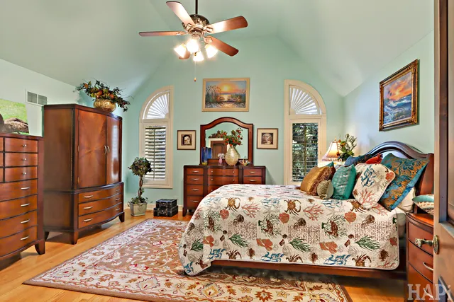 a view of a backyard with sitting area