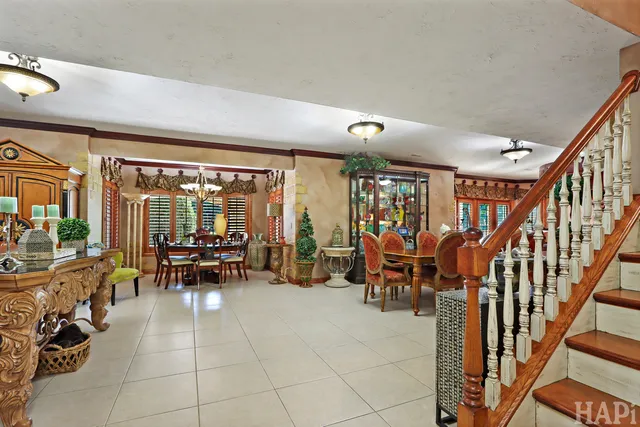 an aerial view of a house with yard