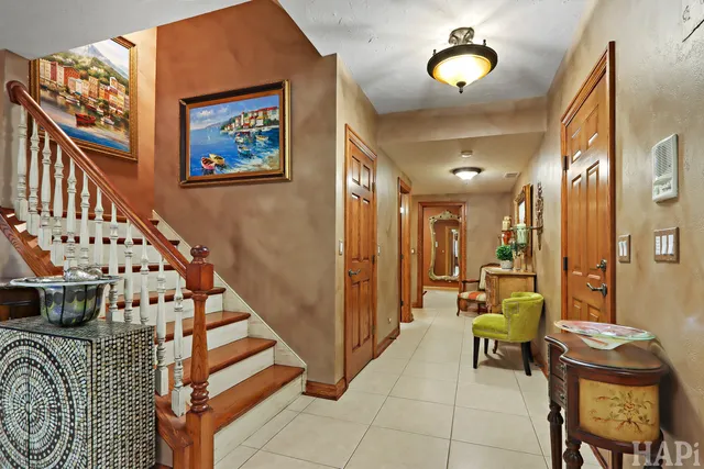 an aerial view of a house with a garden