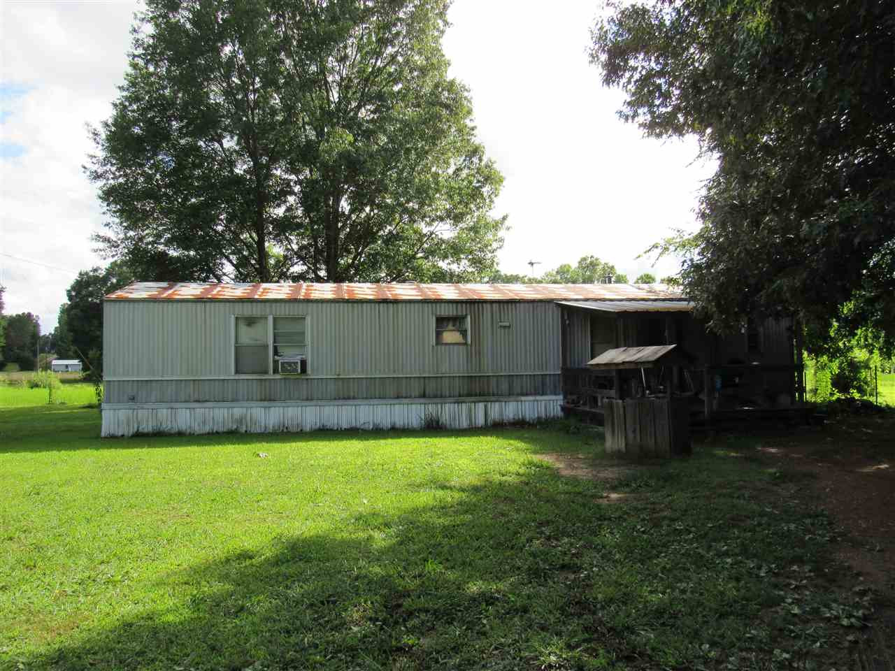1165 Old Finger Road Henderson, TN 38340 - Photo 1 of 1 a view of backyard with barbeque area