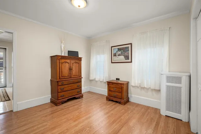 a room with couch and dresser