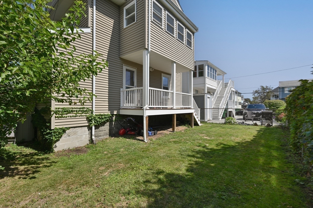 76 Windsor Road, Unit 1 Medford, MA 02155 - Photo 25 of 32 a house view with a garden space