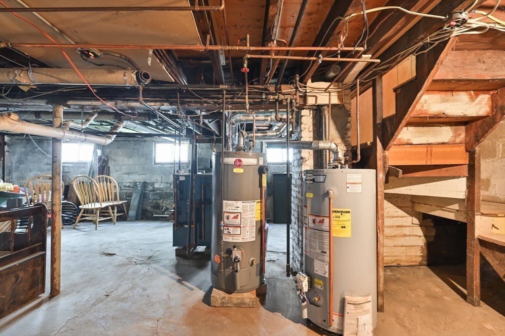 76 Windsor Road, Unit 1 Medford, MA 02155 - Photo 29 of 32 a view of a garage with wooden table