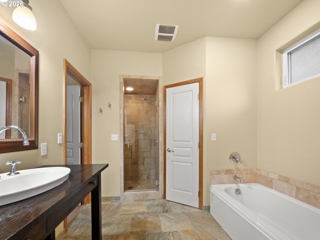 1101 B Avenue La Grande, OR 97850 - Photo 19 of 35 a bathroom with a bathtub and a sink