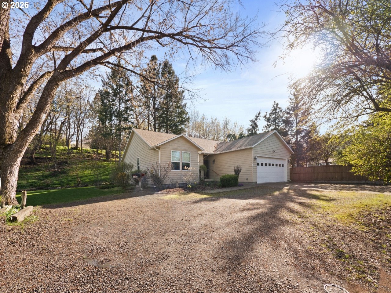 1101 B Avenue La Grande, OR 97850 - Photo 2 of 35 a view of a house with a yard covered in snow