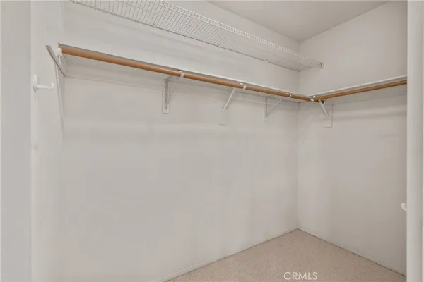 a view of an empty walk in closet