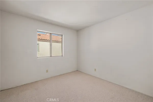 a view of a workspace with furniture