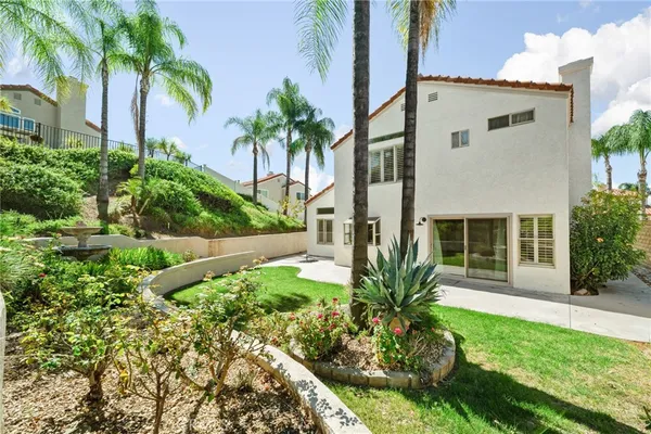 an aerial view of residential building and parking space