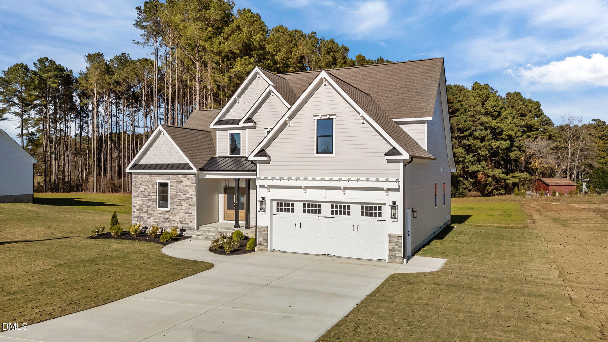 2568 Lassiter Road Four Oaks, NC 27524 - Photo 1 of 50 a view of white house with a yard