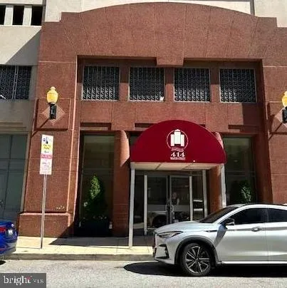 a front view of a house with parking