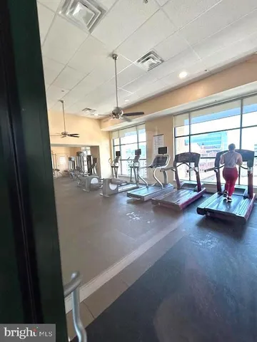 a outdoor view of a building with traffic signal lights