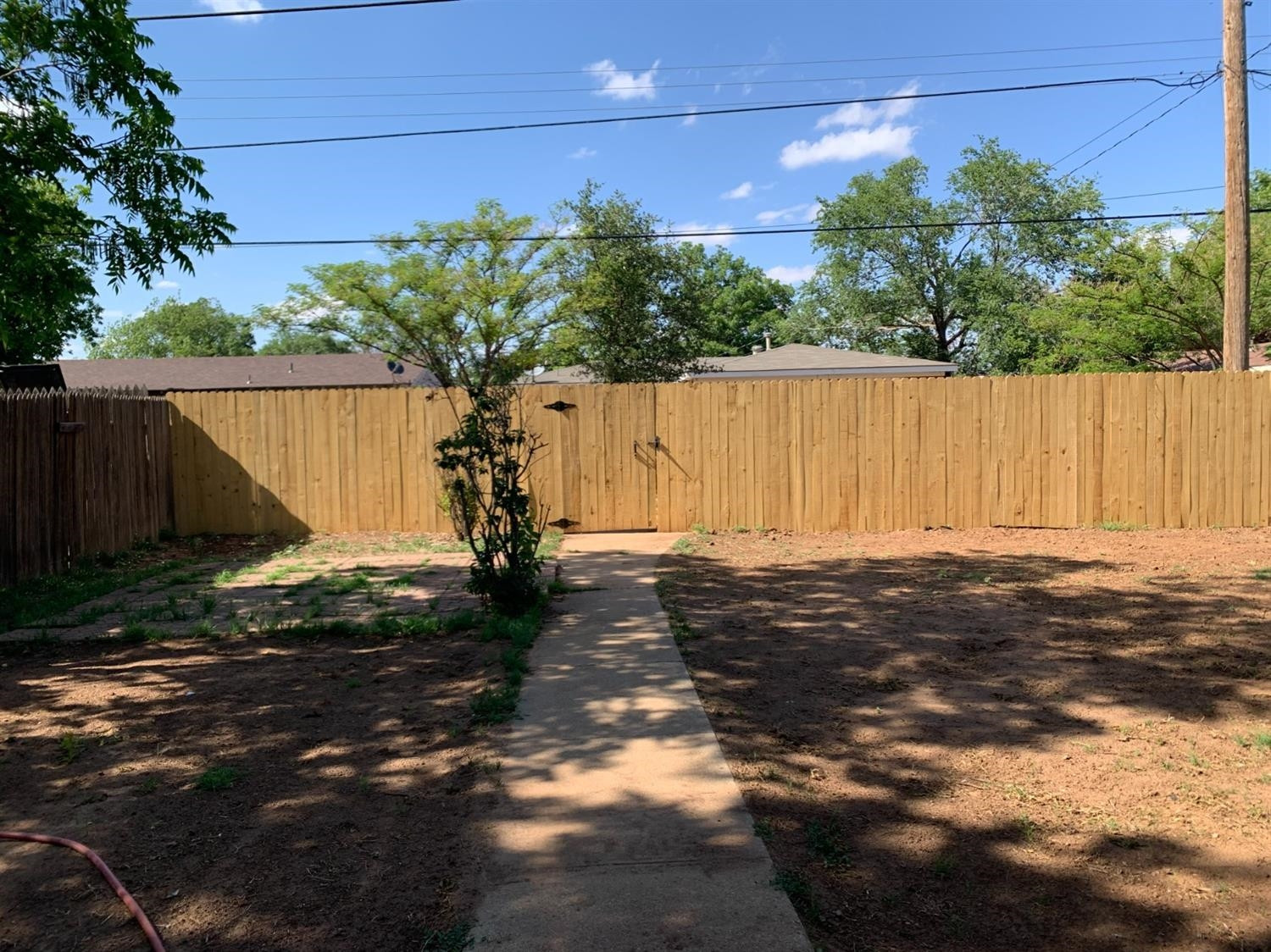 2812 56th Street Lubbock, TX 79413 - Photo 14 of 14 a view of a house with a yard