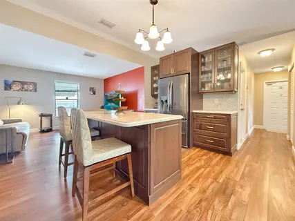 a room with furniture and a wooden floor