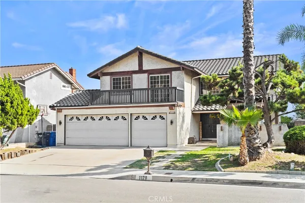 a house on the side of a street