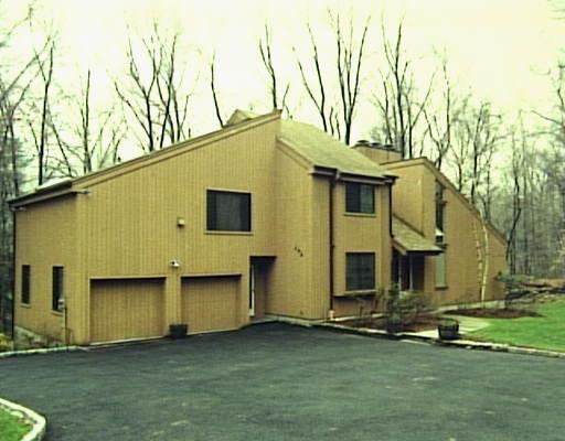 494 Haviland Road Stamford, CT 06903 - Photo 1 of 1 a front view of a house with a yard
