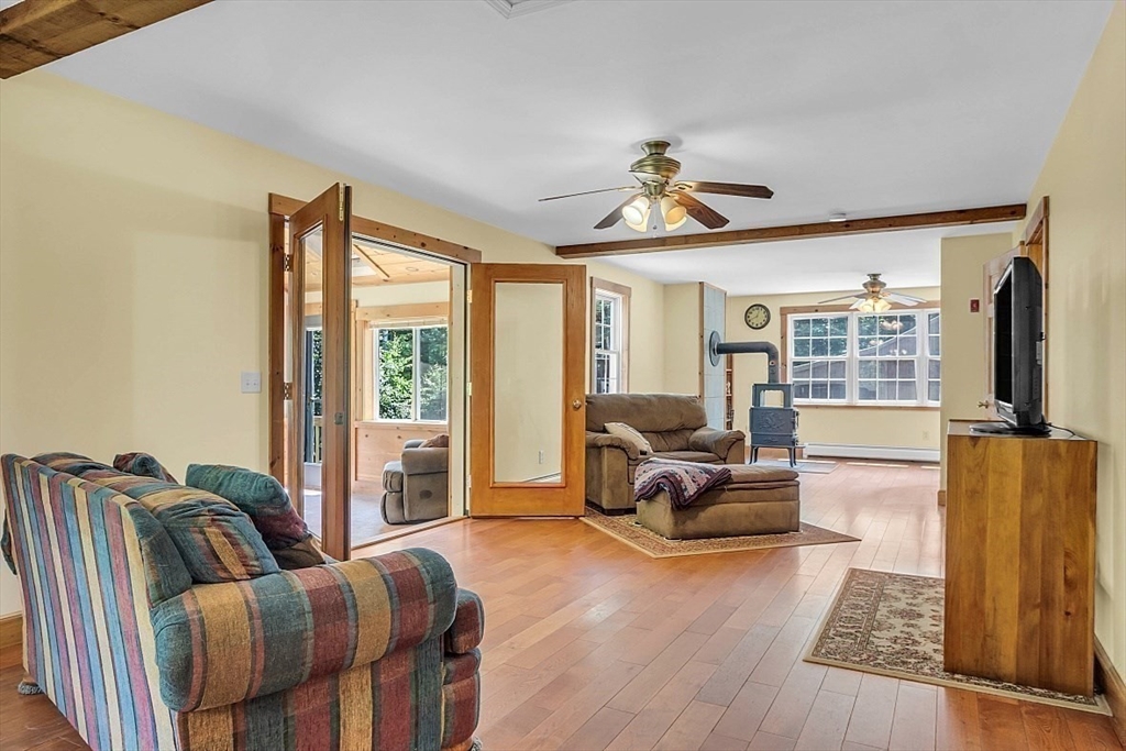 371 Walnut Hill Road Orange, MA 01364 - Photo 19 of 41 a living room with furniture window and wooden floor